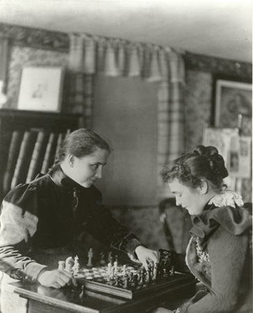 Helen and Anne playing chess, 1900