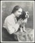 Thumbnail of Photograph of Helen Keller with her bull dog terrier Sir Thomas. ...