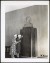 Thumbnail of Photograph of Helen Keller and Polly Thomson standing next to a m...