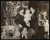 Thumbnail of Photograph taken indoors of Helen Keller holding a doll. Anne S. ...
