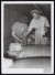 Thumbnail of Photograph of Helen Keller touching a sarcophagus with Polly Thom...