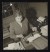 Thumbnail of Photograph of Helen Keller using a braille writer at her home in ...