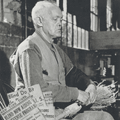 Blind man making broom, WWII era