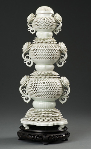 Japanese incense burner, 19th century. White porcelain. 3 bowls, perforated with a honeycomb design, that sit on top of each other.