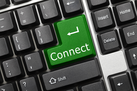 Close-up view on conceptual keyboard with a green 'Connect' key.