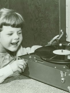 Young girl listening to a Talking Book on a Talking Book