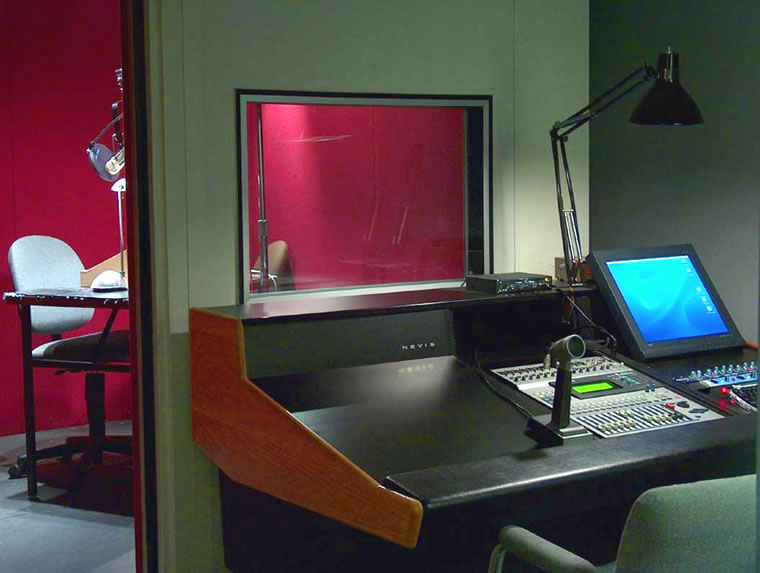 View of the control room and recording booth at today's recording studios of the American Foundation for the Blind in New York City. Talking Book Productions, American Foundation for the Blind.