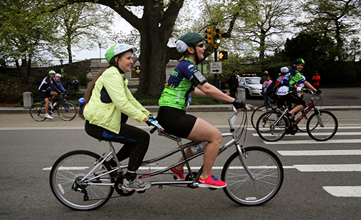 Crista and Tessa on a tandem bike in Central Park in NYC