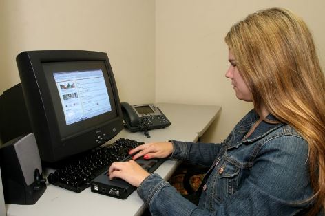 young woman at a computer