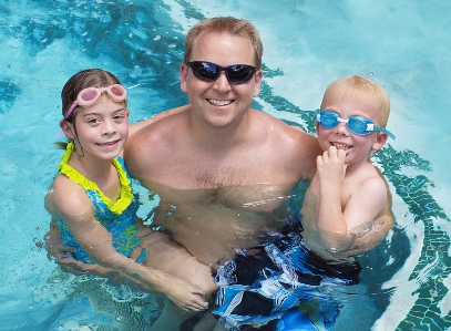 Dad and kids in pool