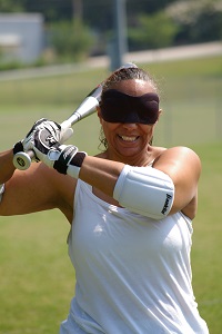 Woman playing beep baseball
