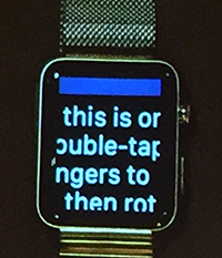 closeup of Apple Watch displaying text