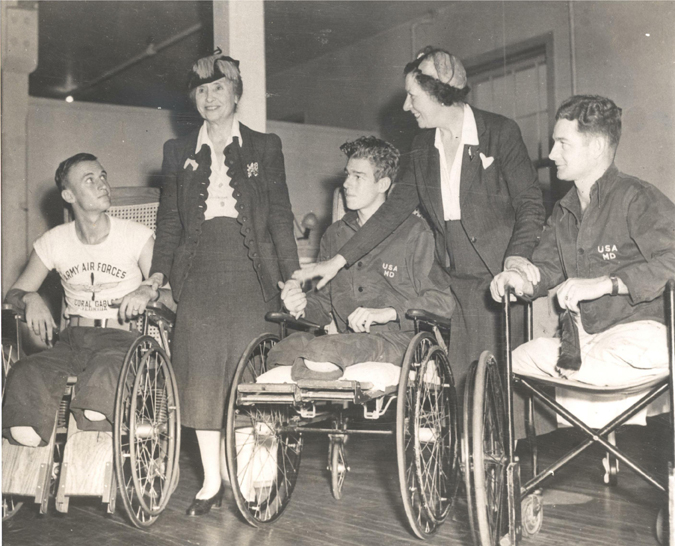 Helen Keller and Polly Thomson with amputees