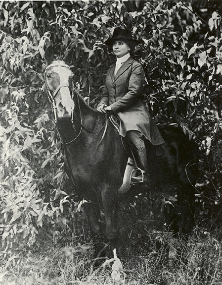 Helen Keller on horseback