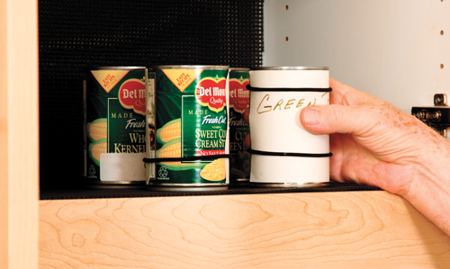 Cans of food with rubber bands placed around at certain spots for accessible identification