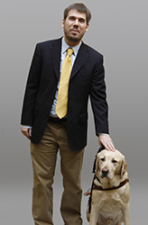 Aaron Preece with his dog guide