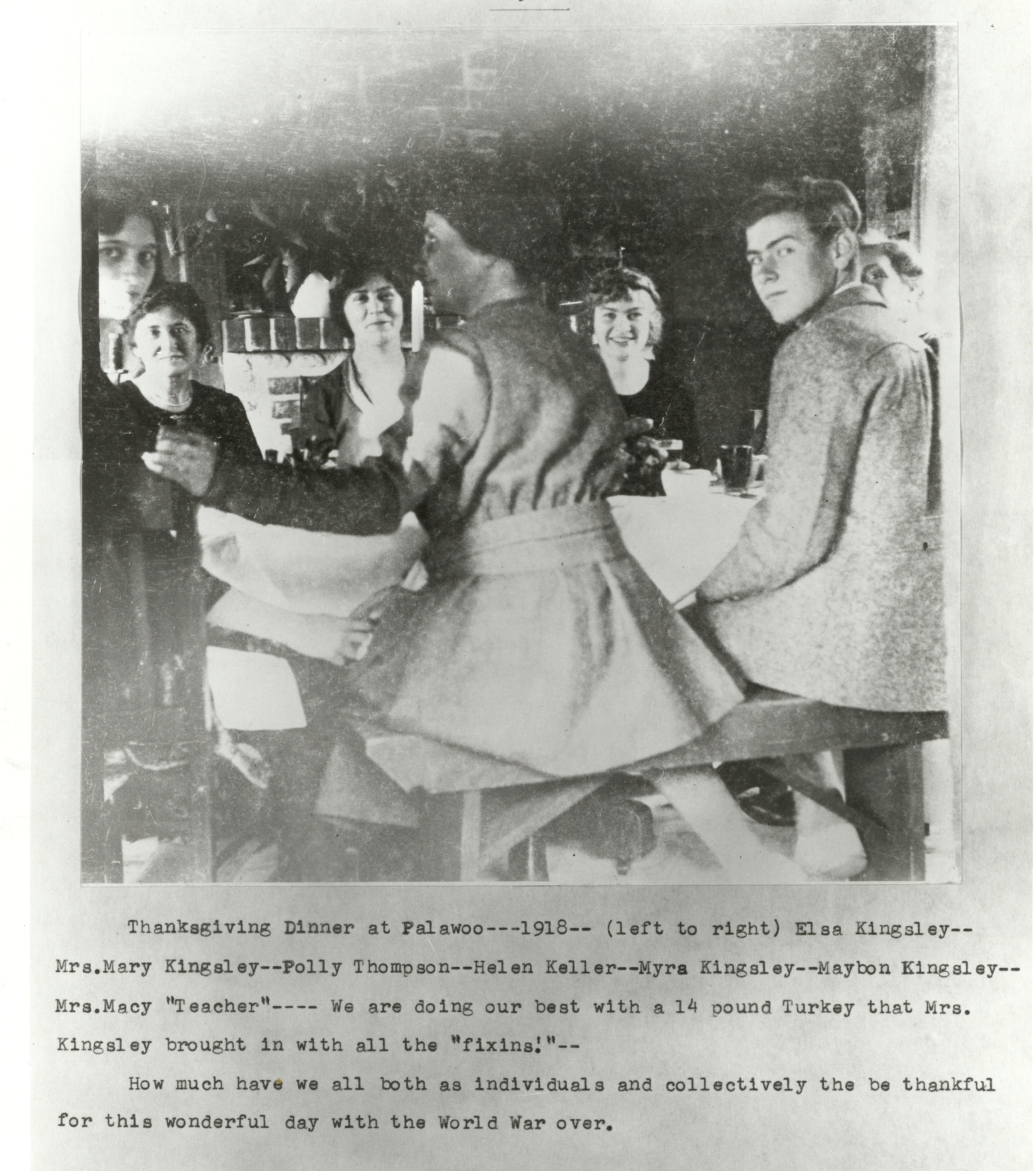 a photo of Helen Keller with friends celebrating Thanksgiving Dinner
