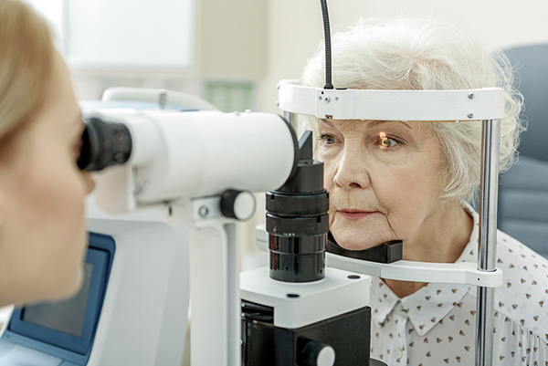 older woman at an eye exam