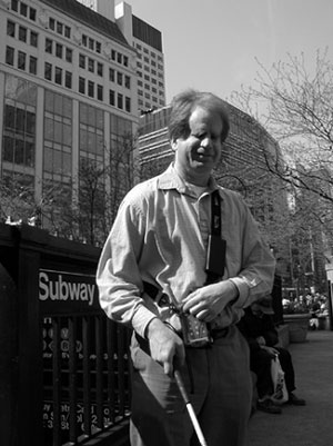 Figure 2: Photograph of Jay Leventhal using the Trekker outside of a subway station in Manhattan.