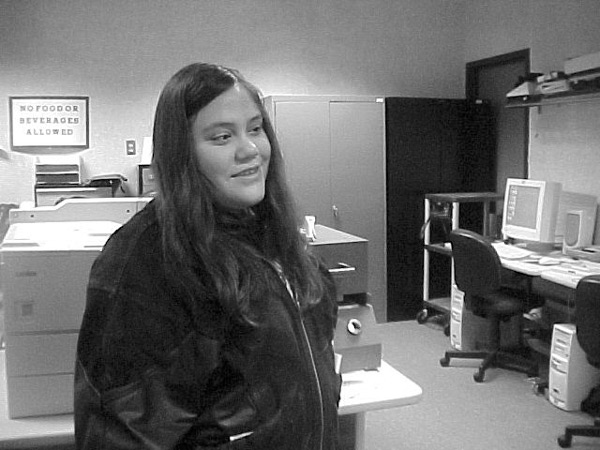 Figure 2: Photograph of Kristin Miller in a technology lab.