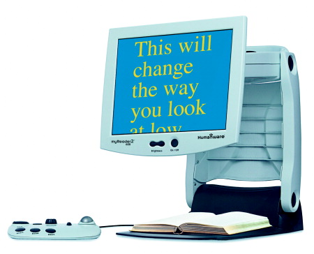 myReader2 with a book on its viewing table displaying the text in yellow letters on a blue background.