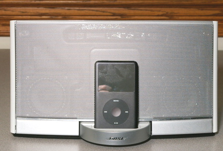A Close-up of the Bose SoundDock containing the iPod Classic.