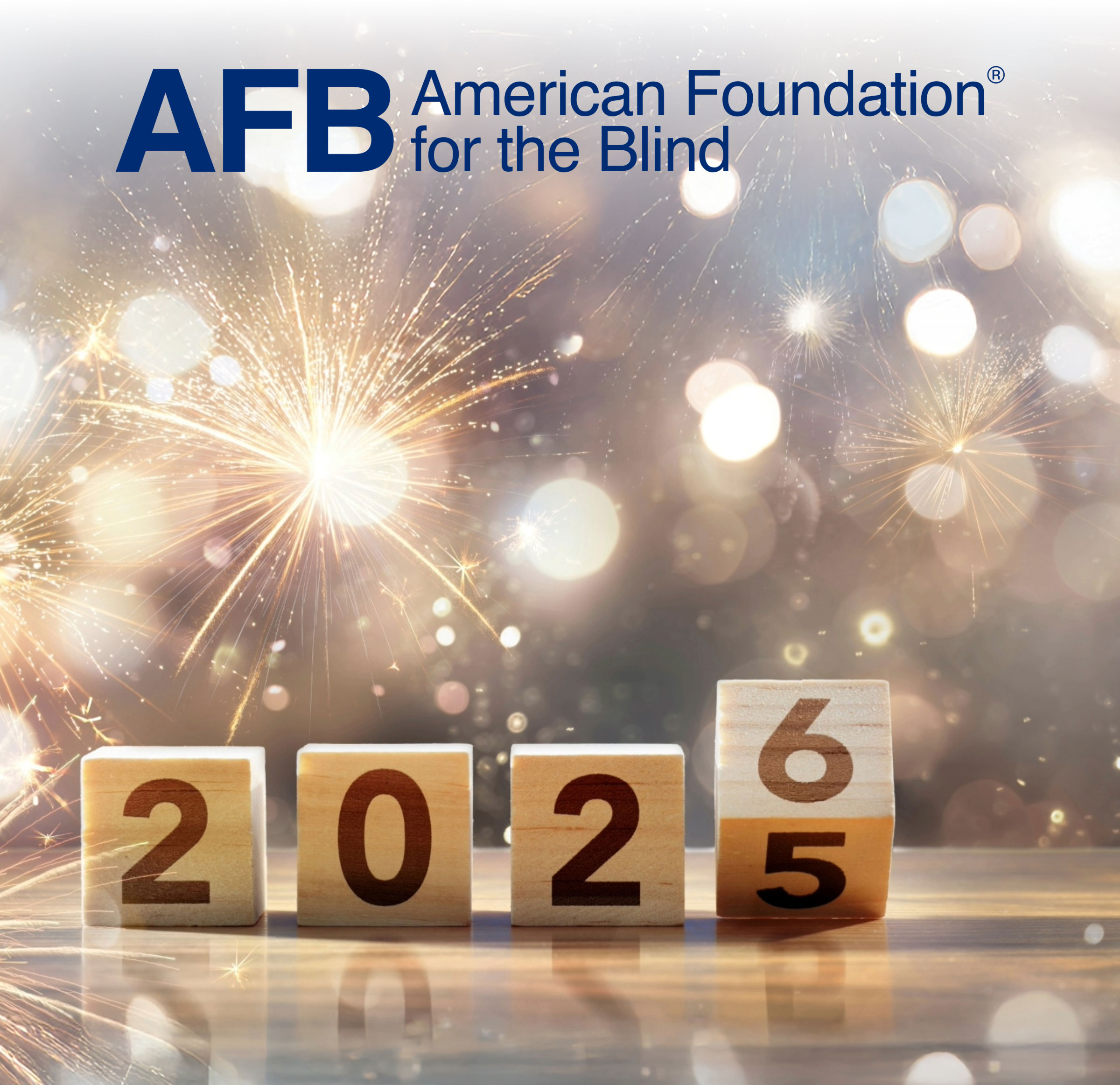 Building blocks spell out 2026. Twinkling lights and fireworks glow in the background.