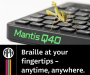 Praying mantis sitting atop the keyboard of the Mantis™ Q40 refreshable braille display.